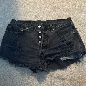 Vintage Levi black shorts with butt rips